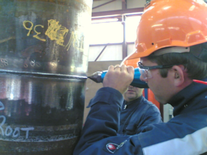 Ultrasonic peening of girth welds on steel pipe St 590