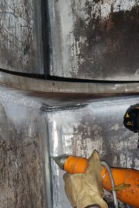 Ultrasonic peening of bracket at stringer level